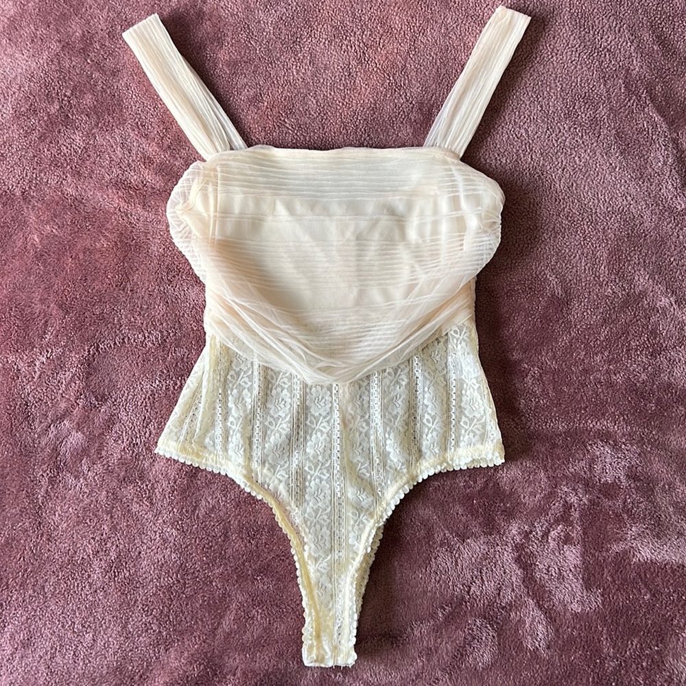 Skylar Rose Siza L lace body suit. See through mid drift.
